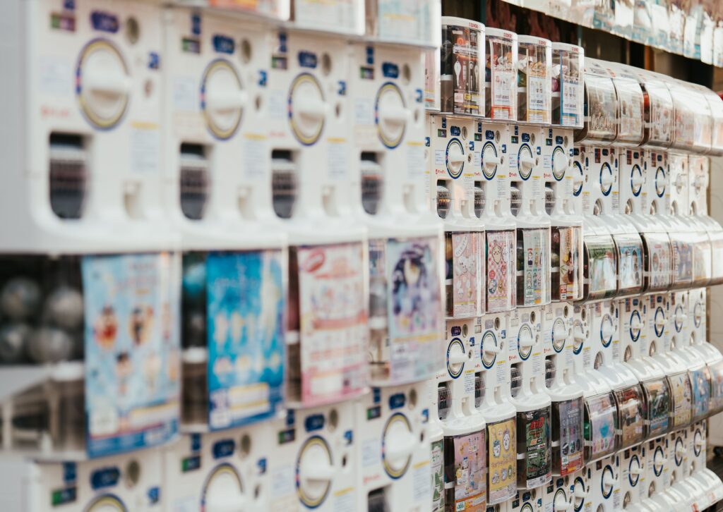 pexels-photo-29537667-29537667 A vibrant row of gachapon vending machines in Japan showcasing a variety of collectible toys.
